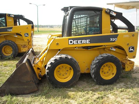 2009 john deere 320 skid steer specs|john deere 320 value.